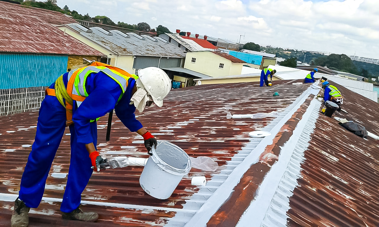 Sicon waterproofing contractors installing membrane on a Johannesburg industrial roof
